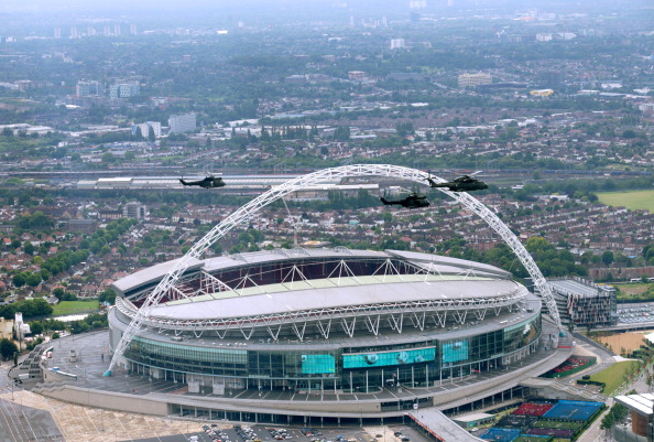 LONDON, ENGLAND - JUNE 14: Helicopters pass Wembley Stadium seen from the air on June 14, 2014 in London, England. (Photo by Matt Cardy/Getty Images)