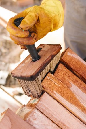 person-varnishing-wood